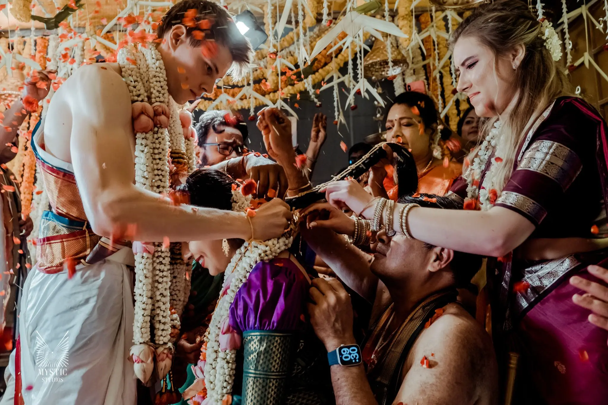 Close-knit multicultural wedding in chennai, muhurtham photographed in candid elegance by Mystic Studios