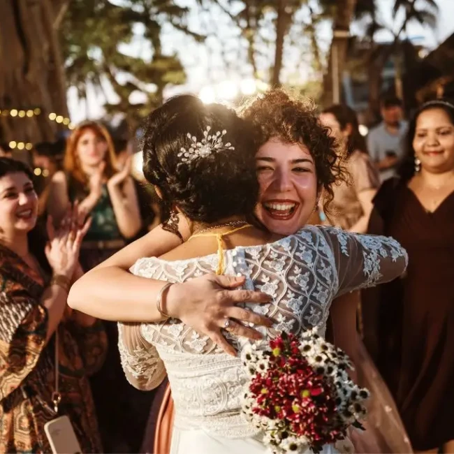 Bouquet throwing Family blessings and candid laughter highlighted with cultural authenticity by Mystic Studios