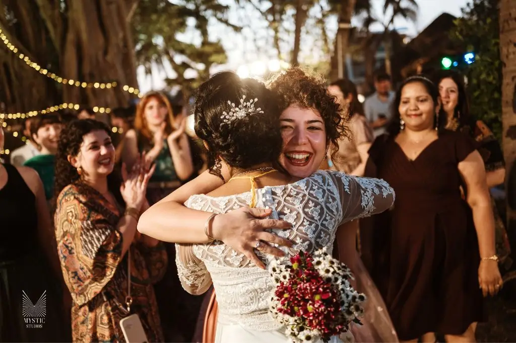 Bouquet throwing Family blessings and candid laughter highlighted with cultural authenticity by Mystic Studios